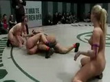Two female teams consists of two babes each wrestling for public